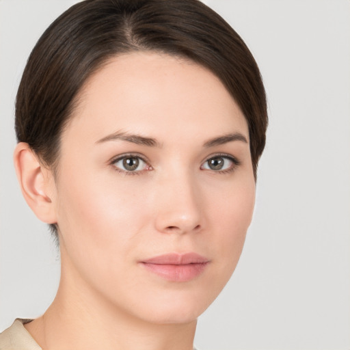 Neutral white young-adult female with short  brown hair and brown eyes