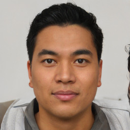 Neutral asian young-adult male with short  black hair and brown eyes