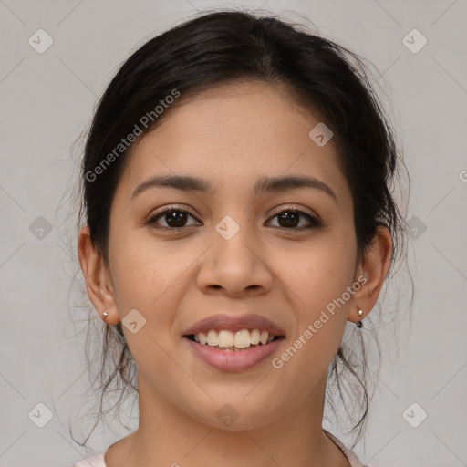 Joyful latino young-adult female with medium  brown hair and brown eyes