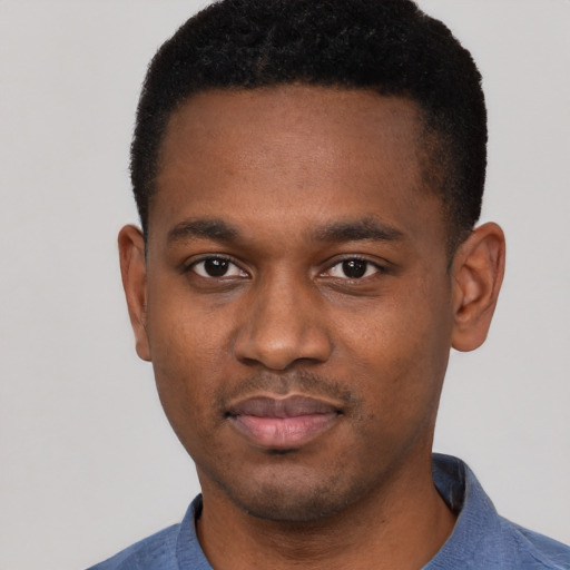 Neutral black young-adult male with short  black hair and brown eyes