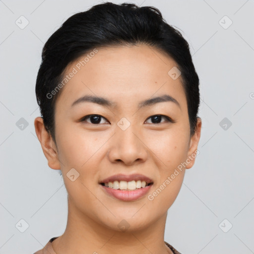 Joyful asian young-adult female with short  black hair and brown eyes