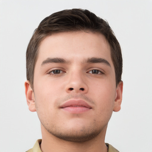 Neutral white young-adult male with short  brown hair and brown eyes