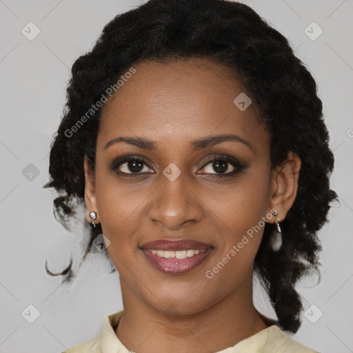 Joyful black young-adult female with medium  brown hair and brown eyes