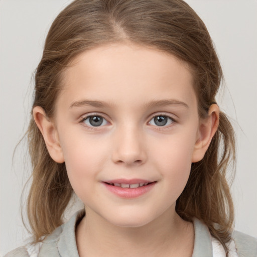 Joyful white child female with medium  brown hair and grey eyes