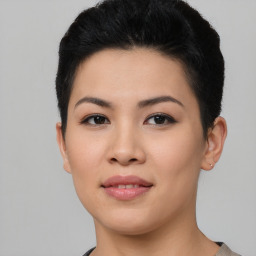 Joyful asian young-adult female with short  black hair and brown eyes