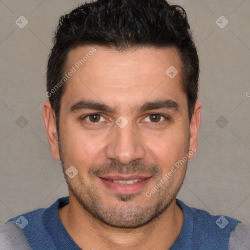 Joyful white young-adult male with short  black hair and brown eyes