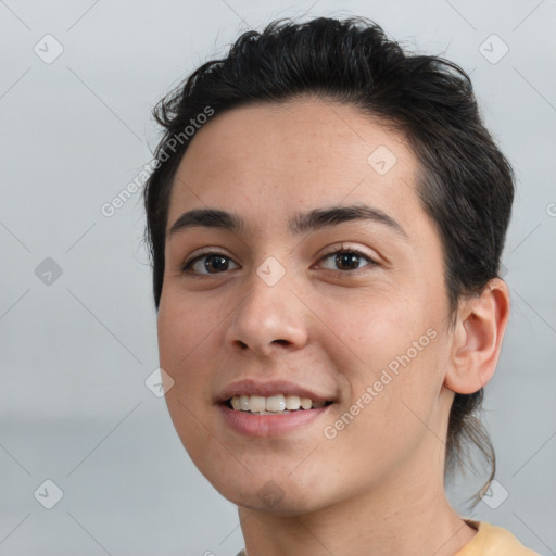 Joyful white young-adult female with short  brown hair and brown eyes