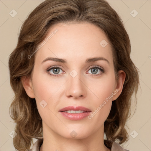 Joyful white young-adult female with medium  brown hair and green eyes