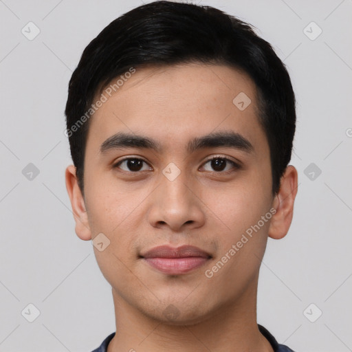 Joyful asian young-adult male with short  black hair and brown eyes