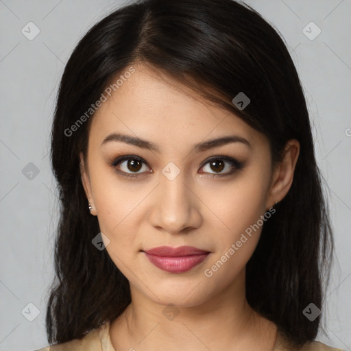 Joyful latino young-adult female with medium  brown hair and brown eyes