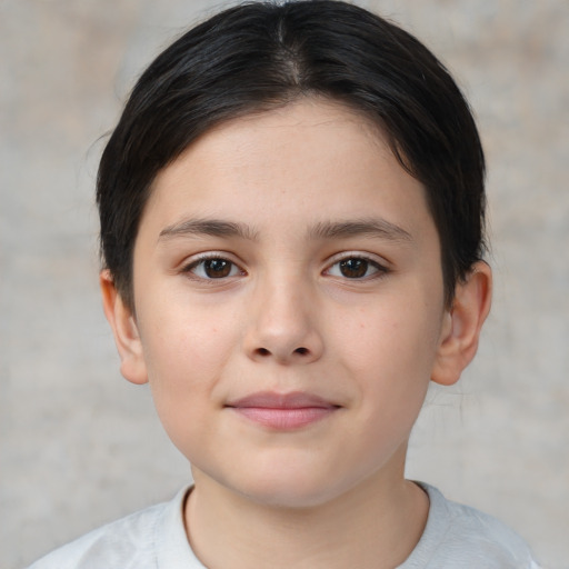 Joyful white child female with short  brown hair and brown eyes