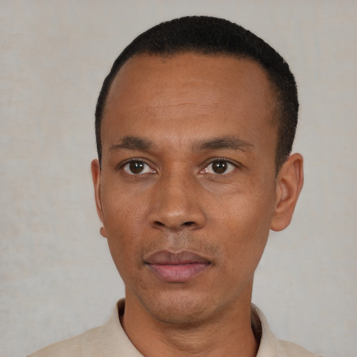 Neutral black adult male with short  black hair and brown eyes
