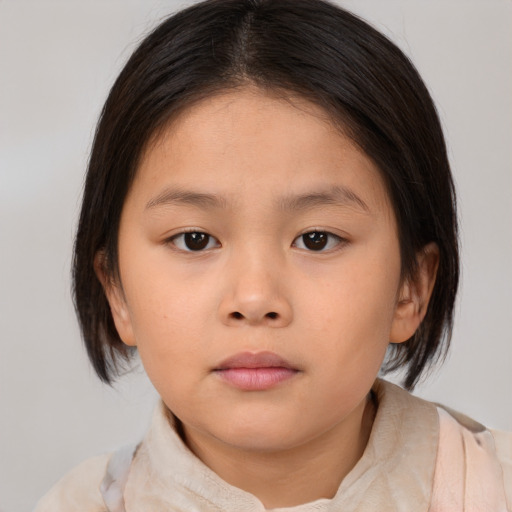 Neutral asian child female with medium  brown hair and brown eyes