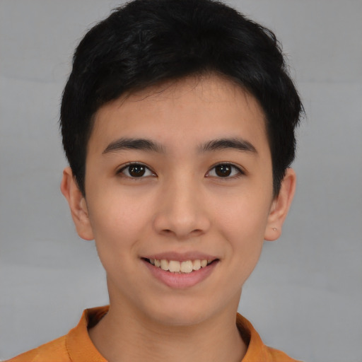 Joyful asian young-adult female with short  black hair and brown eyes