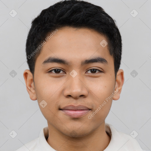 Joyful latino young-adult male with short  black hair and brown eyes