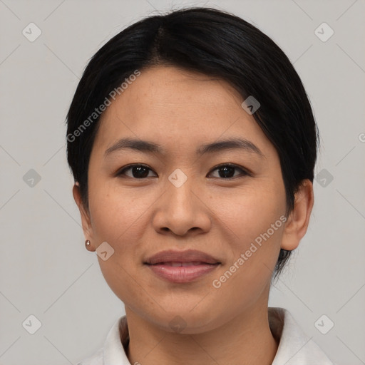 Joyful asian young-adult female with short  black hair and brown eyes