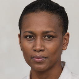 Neutral black young-adult female with short  black hair and brown eyes