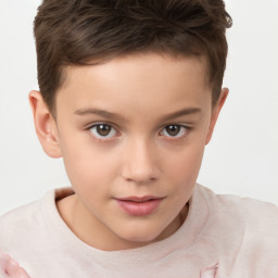 Joyful white child male with short  brown hair and brown eyes