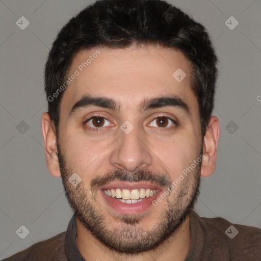 Joyful white young-adult male with short  black hair and brown eyes