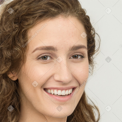 Joyful white young-adult female with long  brown hair and green eyes