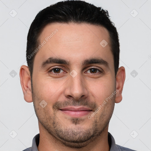 Joyful white young-adult male with short  brown hair and brown eyes