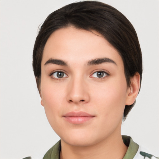 Neutral white young-adult female with medium  brown hair and brown eyes