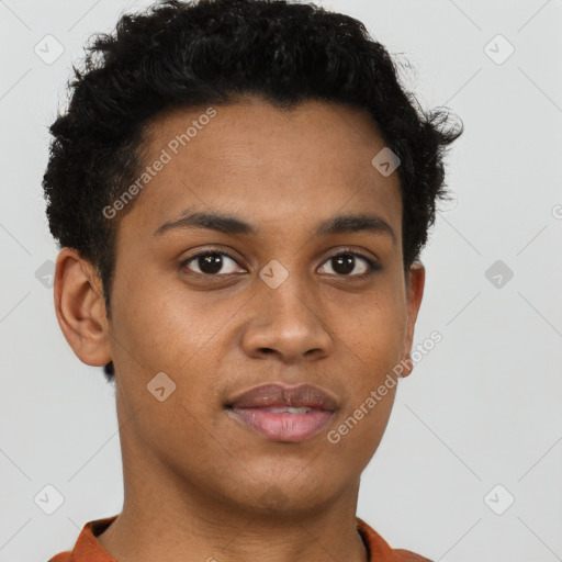 Joyful black young-adult male with short  brown hair and brown eyes