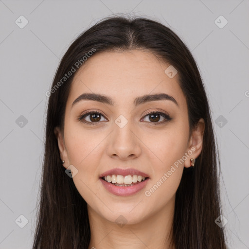 Joyful white young-adult female with long  brown hair and brown eyes