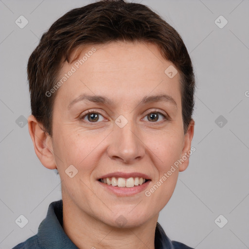 Joyful white adult female with short  brown hair and brown eyes