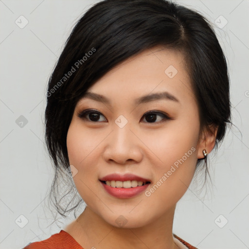 Joyful asian young-adult female with medium  black hair and brown eyes