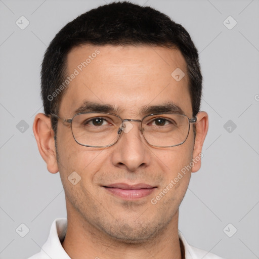 Joyful white adult male with short  brown hair and brown eyes