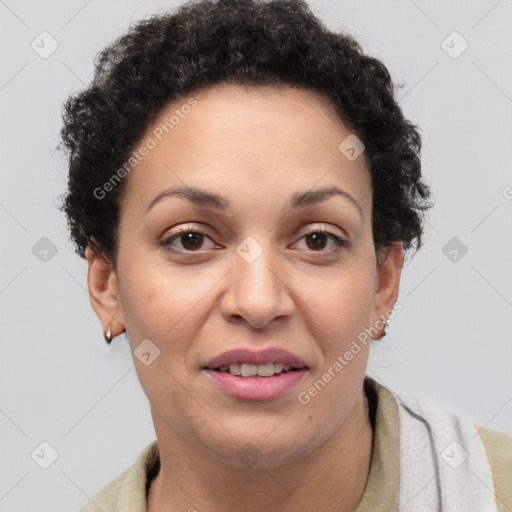 Joyful black adult female with short  brown hair and brown eyes