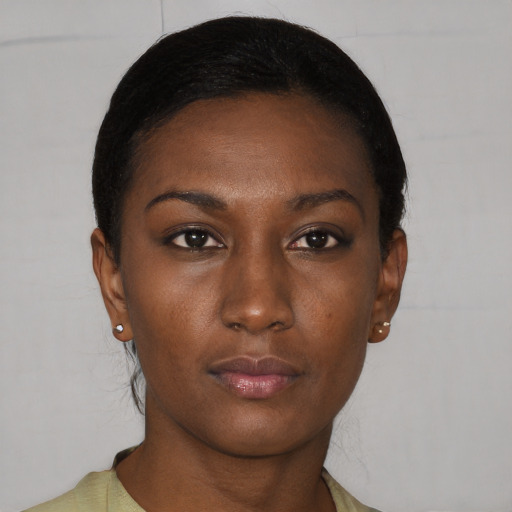 Neutral black young-adult female with short  black hair and brown eyes