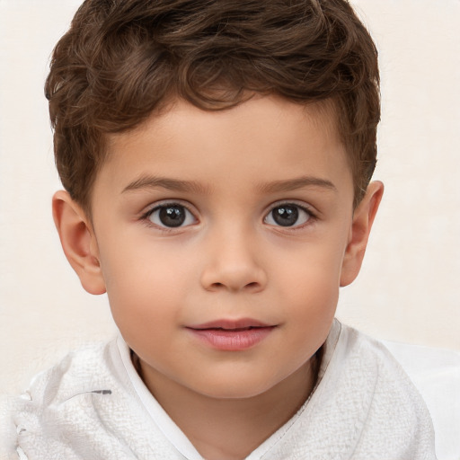 Joyful white child male with short  brown hair and brown eyes