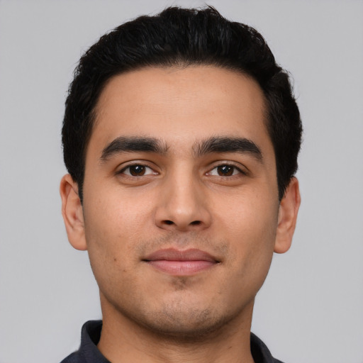 Neutral latino young-adult male with short  black hair and brown eyes