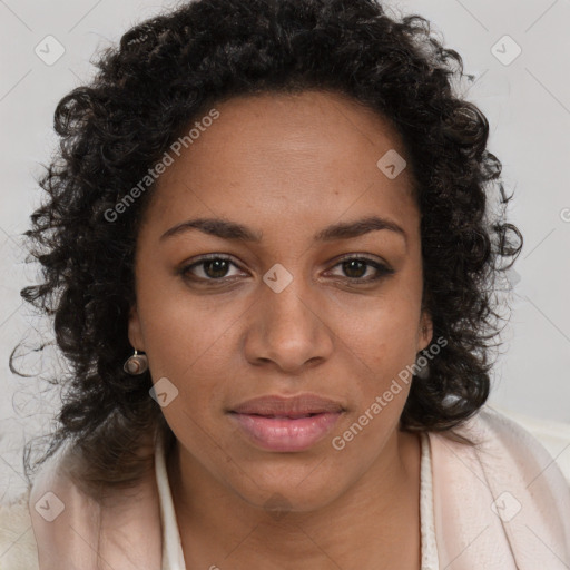 Joyful black young-adult female with long  brown hair and brown eyes