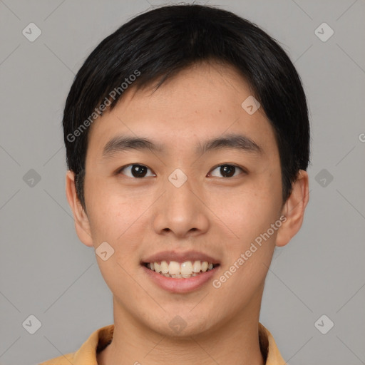 Joyful asian young-adult male with short  black hair and brown eyes