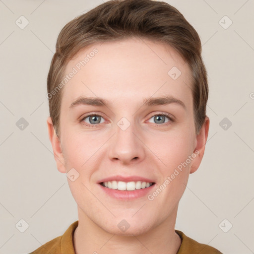 Joyful white young-adult female with short  brown hair and grey eyes