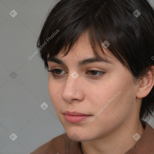 Neutral white young-adult female with medium  brown hair and brown eyes