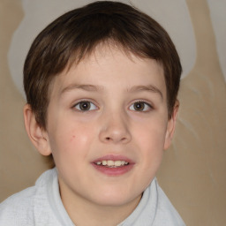 Joyful white child male with short  brown hair and brown eyes