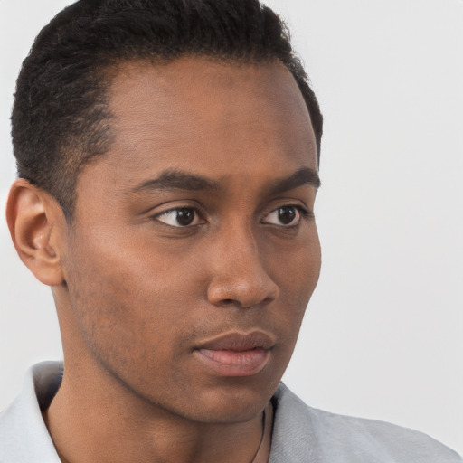 Neutral black young-adult male with short  brown hair and brown eyes