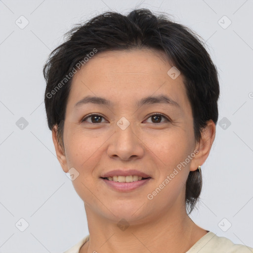 Joyful asian young-adult female with short  brown hair and brown eyes