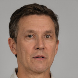 Neutral white middle-aged male with short  brown hair and brown eyes