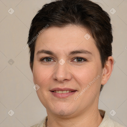 Joyful white young-adult female with short  brown hair and brown eyes