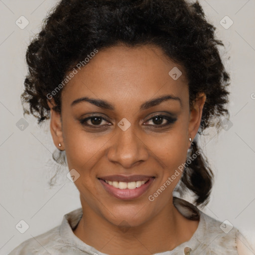 Joyful black young-adult female with medium  brown hair and brown eyes