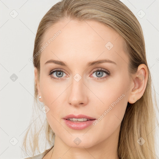 Joyful white young-adult female with long  brown hair and blue eyes