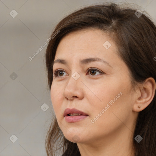 Neutral white young-adult female with long  brown hair and brown eyes