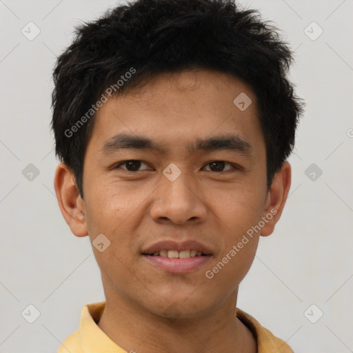 Joyful asian young-adult male with short  brown hair and brown eyes