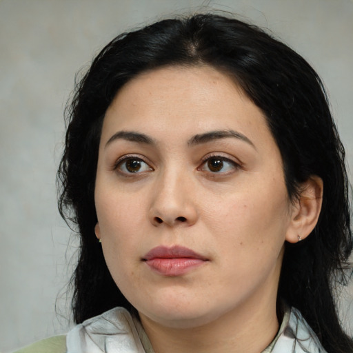 Joyful asian young-adult female with medium  black hair and brown eyes