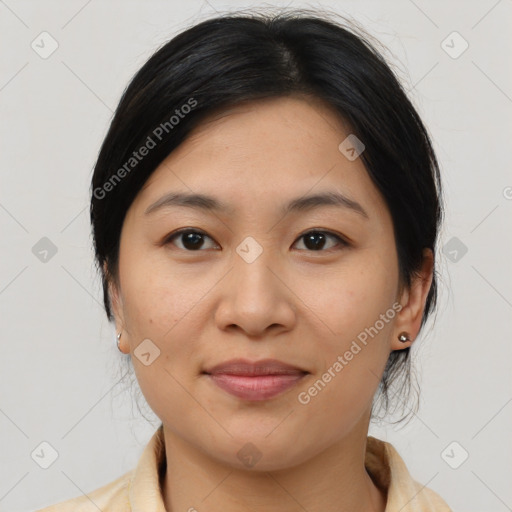 Joyful asian young-adult female with medium  brown hair and brown eyes